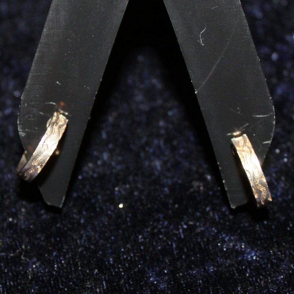 Gold toned hooped screw Earrings